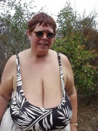 Redhead Super Busty Grandma with Huge Sagging Boobs in a Black & White Bikini Top.jpg
