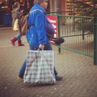 Grey Haired Busty Grandma with Massive Boobs Walking with Shopping Bag Candid Profile Shot.jpg
