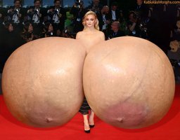 so-tu-brings-her-giant-silicone-tits-and-pregnant-belly-to-the-red-carpet-d.jpg