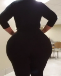Brunette Busty Big Hourglass Massively Big Beautiful Butt Hips and Thighs in a Black Top and T...png