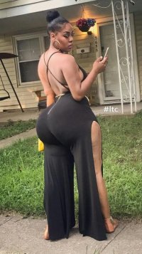 Black Big Butt Beauty with a Massive Ass in a Sexy Slit  Lowcut Black Pants Suit and Fancy San...jpg