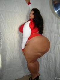 Latina with Massive Booty and Legs in Red Top Profile Shot.jpg