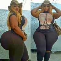 Black Super Voluptuous Beauty with Big Legs and a Huge Round Butt in a Sexy Tight Grey Top and...jpg
